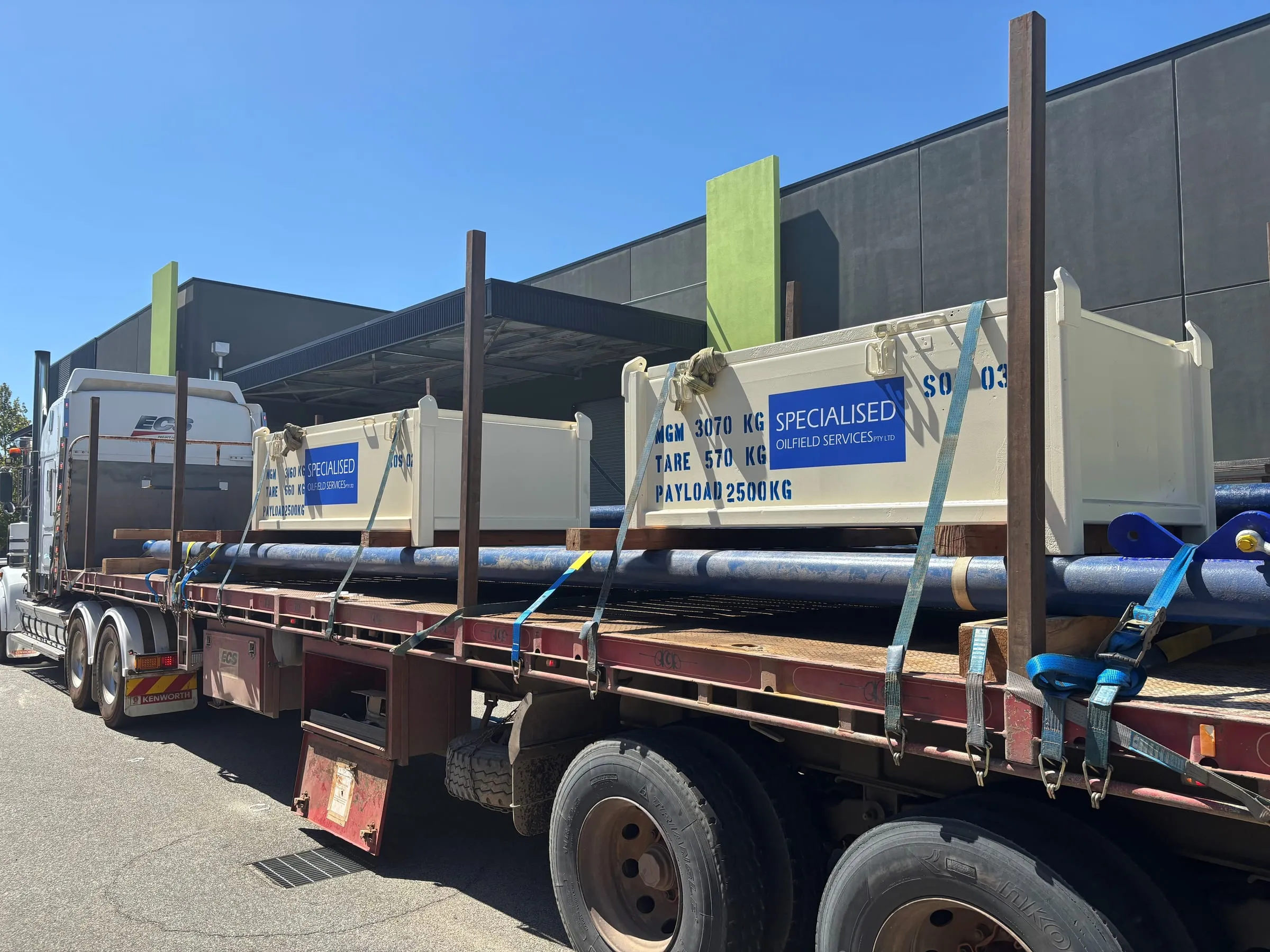 SOS coring equipment strapped to a flatbed truck outside the workshop, ready to mobilise