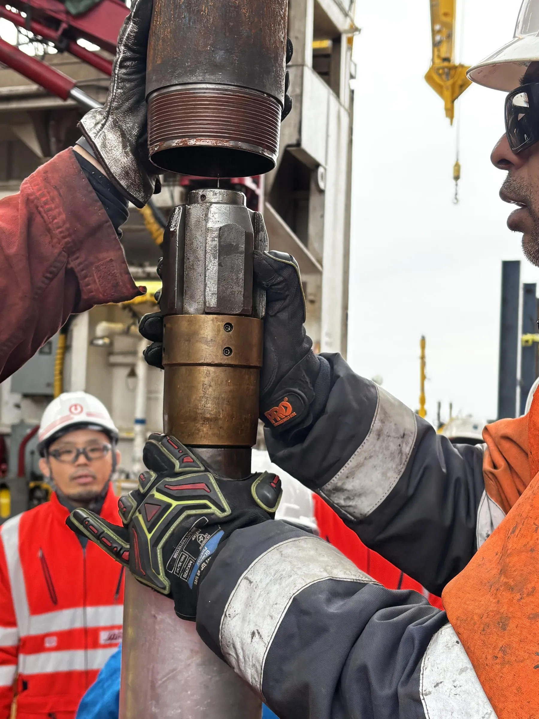 Engineer lowering the SureCore rabbit into the core barrel