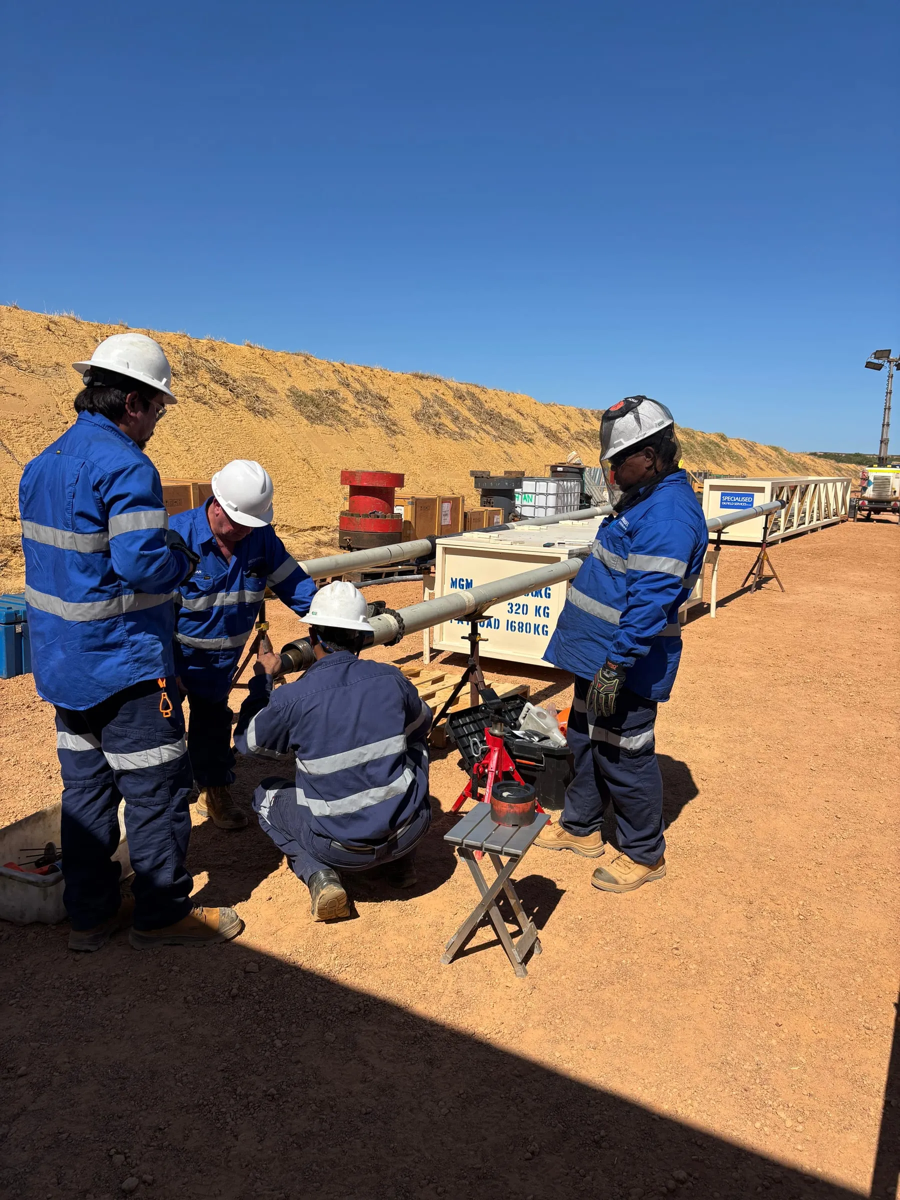SOS engineers carrying out pre-run checks on the SureCore at an onshore wellsite